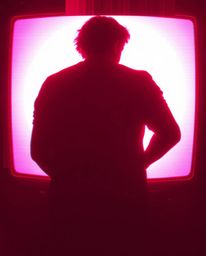 A captivating surreal infrared image presents a silhouetted figure bathed in otherworldly light.  The retro-style image incor
