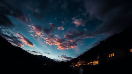 Experience the charm of a cozy village nestled in a valley under a vibrant, colorful sky. This low-angle perspective is rende