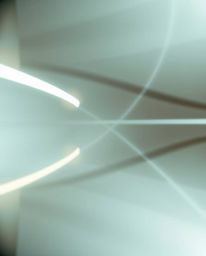 A captivating photograph showcasing a minimalist geometric pattern of circles and lines, reminiscent of Bauhaus style.  Long 