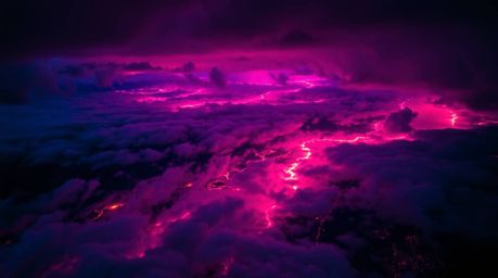 Experience the breathtaking beauty of a river delta bathed in the dramatic colors of twilight.  This stunning aerial shot sho