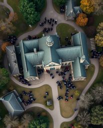 Explore a breathtaking overhead bird's-eye view of a magical school teeming with young wizards. This top-down perspective sho