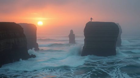 Experience a captivating blend of soft pastel hues and eerie undertones as waves crash against rugged cliffs beneath a blazin