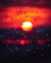 An adorable and charming scene of snowflakes falling during a vibrant sunset is presented in a uniquely strong and moody styl