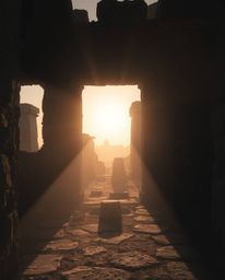 A soft and dreamy atmosphere envelops a scene where a sunset casts shadows through ancient stone ruins. The image is characte