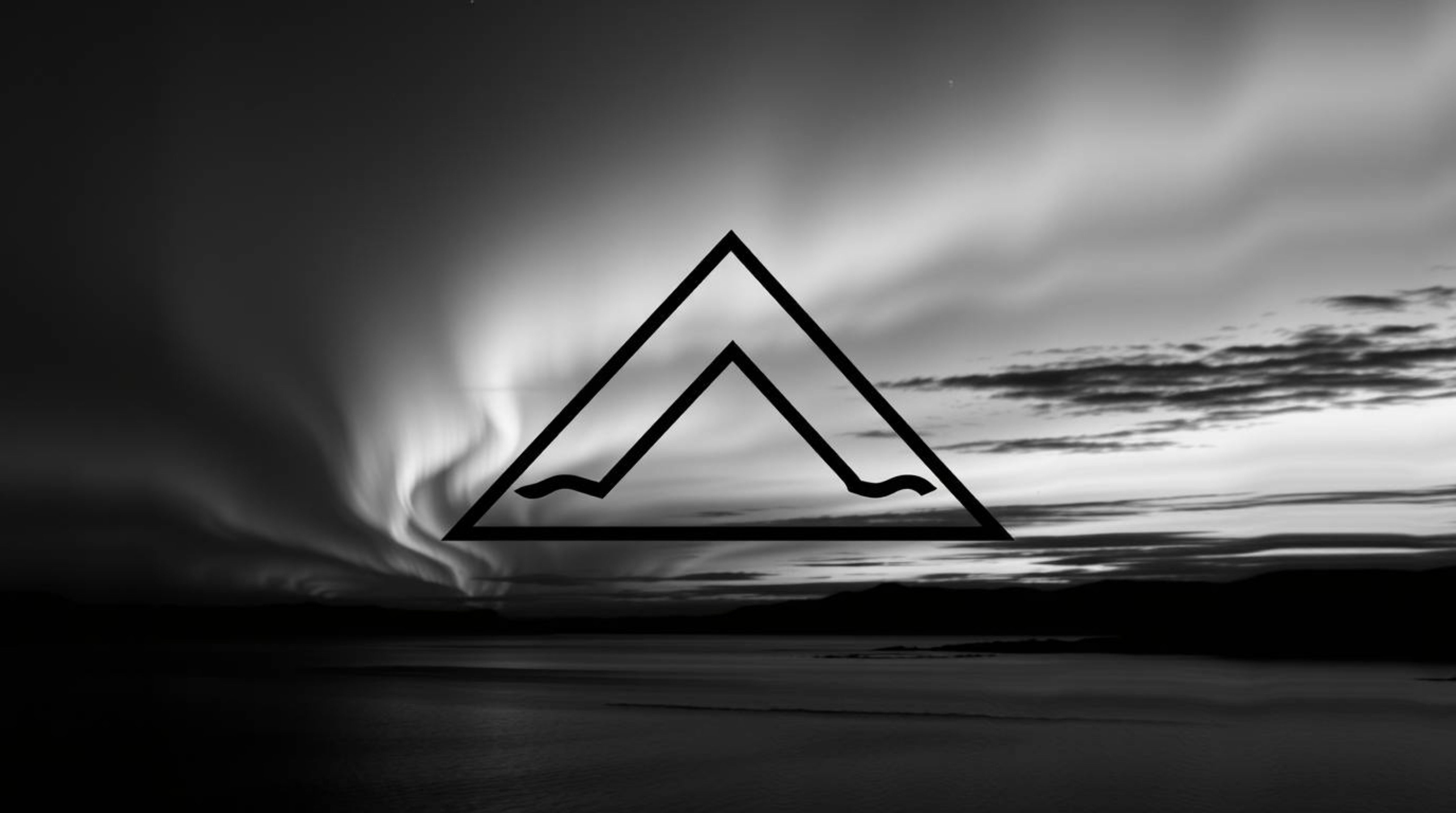 A classic black and white cinematic logo features clean geometric shapes.  The design is complemented by imagery of the North