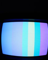 A captivating close-up reveals a gentle, soothing TV screen glitch rendered in soft pastel hues.  The subtle yet detailed ret