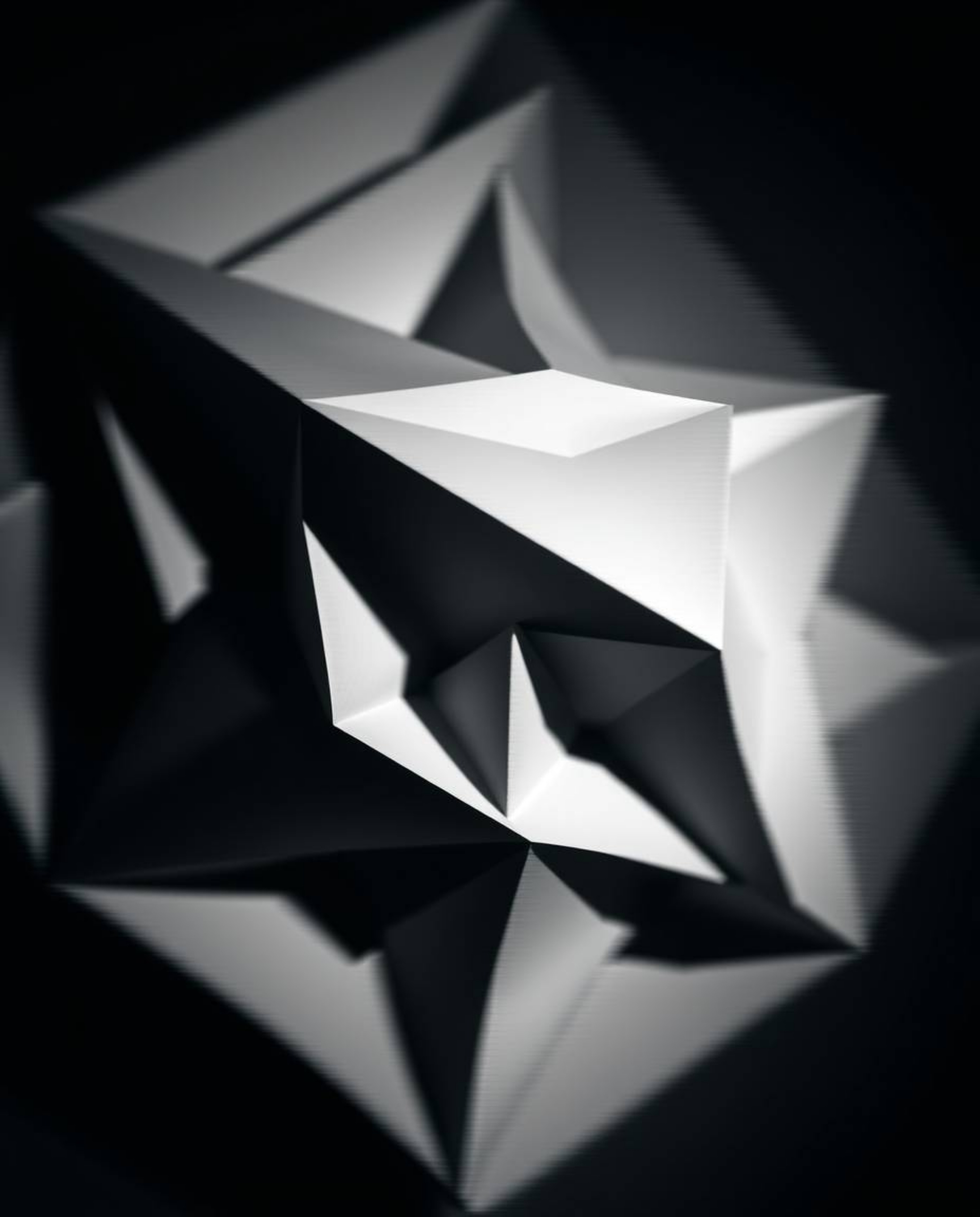 Explore the captivating world of monochrome long-exposure photography featuring a 3D geometric pattern reminiscent of folded 