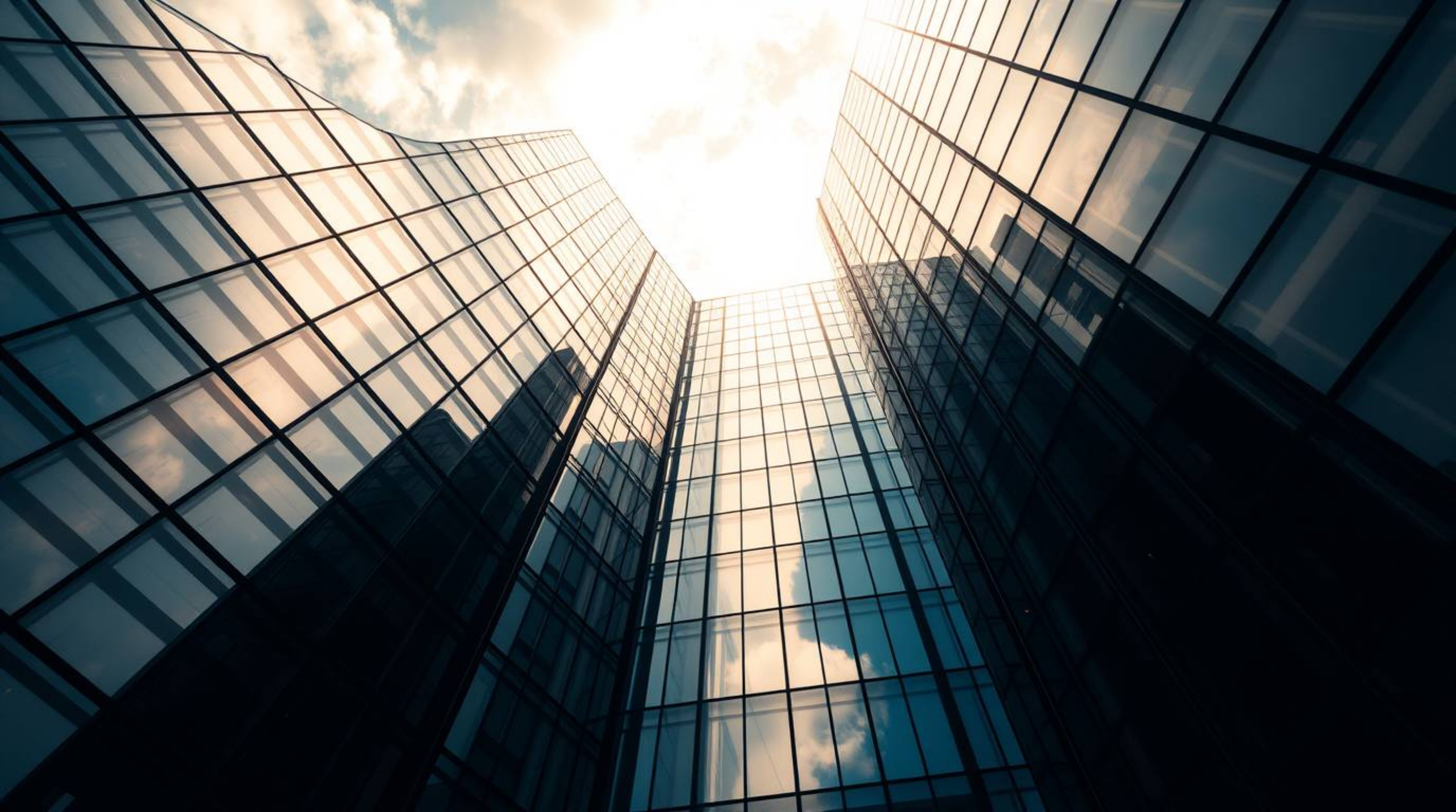 A modern glass building seamlessly blends into the sky in this striking high-angle perspective shot. Intense, dramatic lighti