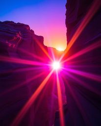 A sunset illuminates sandstone cliffs, rendered in deep ultraviolet hues and vibrant purples. The image is characterized by h