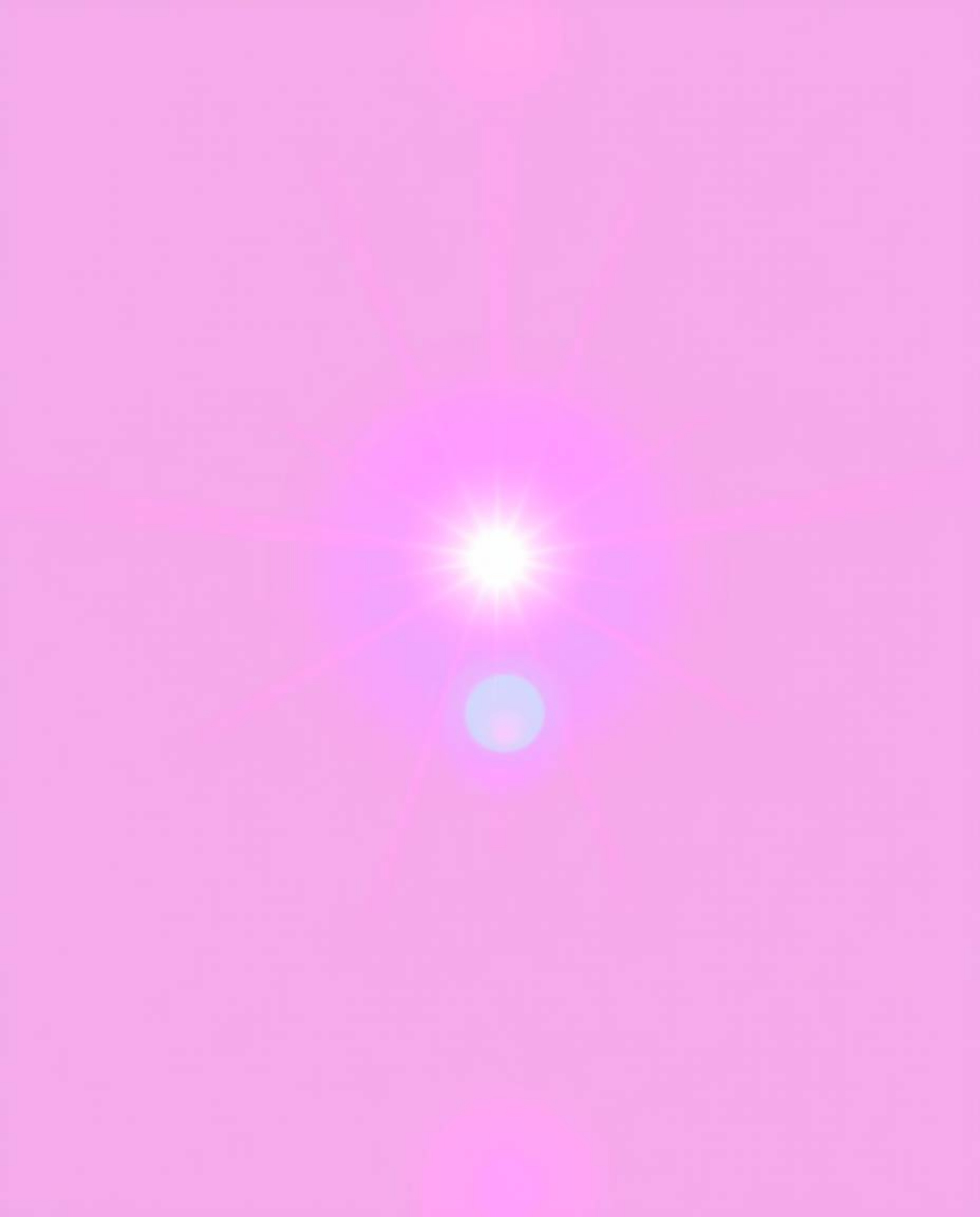A captivating image featuring a bold split lens flare effect.  Vibrant pink, blue, and violet hues blend softly in a gradient