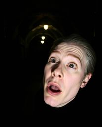 A person with pale skin and a look of awe stumbles upon a hidden underground library bathed in intense jet black shadows, cre