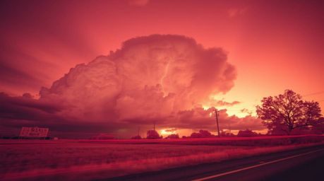 Experience the surreal beauty of a thunderstorm captured with infrared photography.  This image showcases long exposure techn