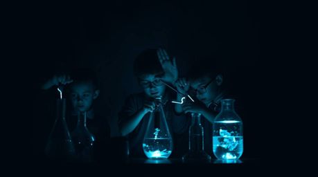 This captivating art piece features intense jet-black creative light, depicting a group of quirky children in school uniforms