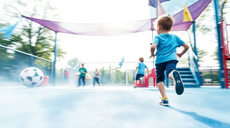 Experience a dramatic slow-motion run through a playground, captured in a breathtaking watercolor painting. This stunning art