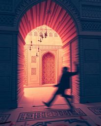 Explore the beauty of Islamic geometric patterns carved in stone through a dynamic and surreal infrared lens. This image capt