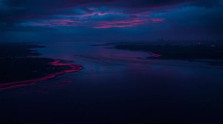 Experience the unsettling yet sophisticated elegance of a river delta bathed in twilight colors. Rich burgundy and deep blue 