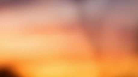Capture the ethereal beauty of a sunset with this stunning image featuring a blurred bokeh effect.  The gradient sky texture 