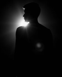 This collection features classic black and white photographs of silhouetted figures with backlighting.  The images incorporat