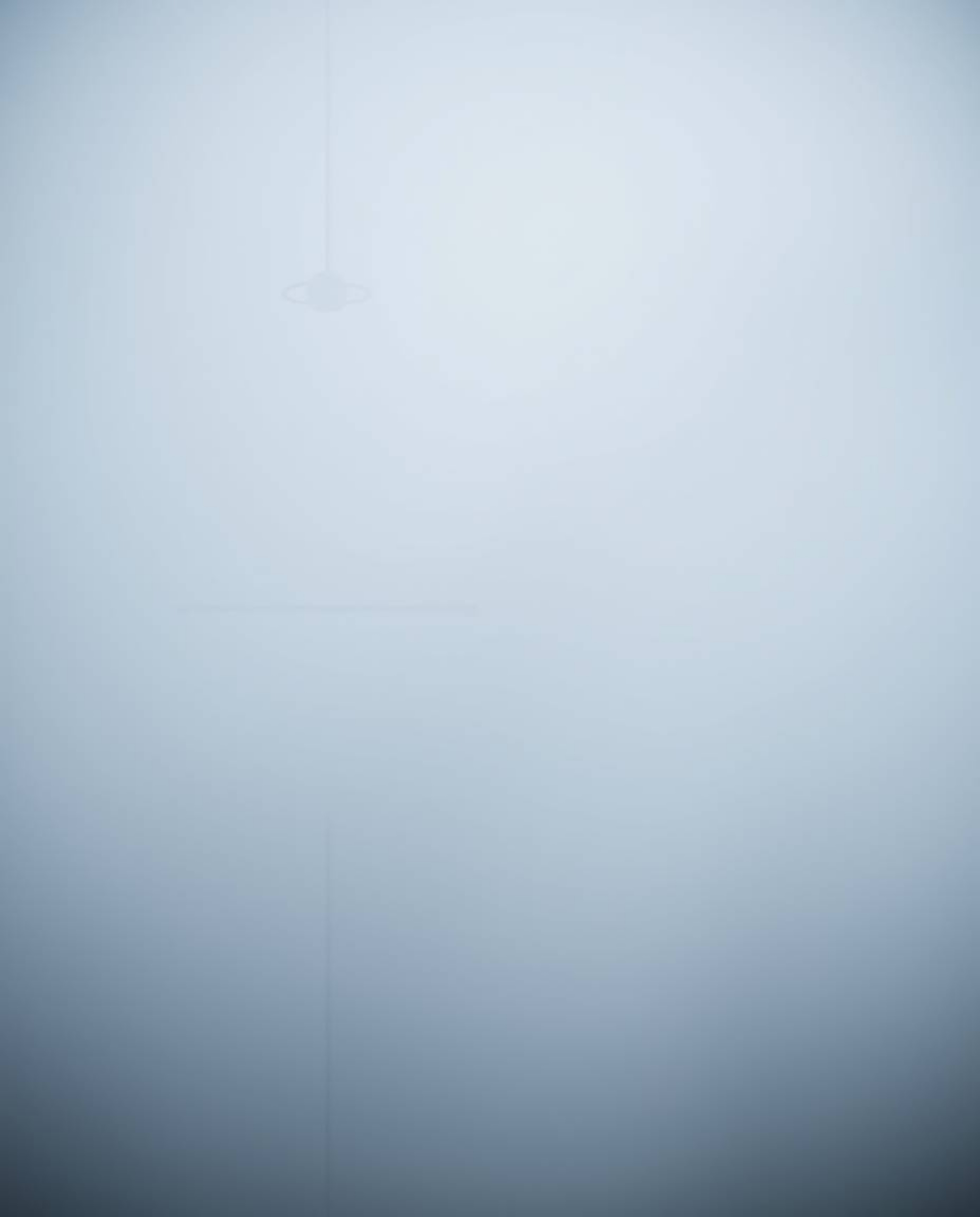 This image presents a hazy minimalist geometric pattern in the Bauhaus style, featuring circles and lines enveloped in a thic