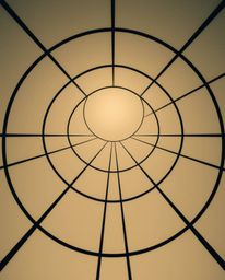 Discover a surreal, minimalist artwork featuring a Bauhaus-inspired geometric pattern of circles and lines.  The dramatic upw