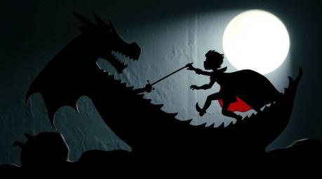 A captivating image depicting a silhouetted papier-mâché sculpture of a charming prince battling a dragon.  Rendered in a str