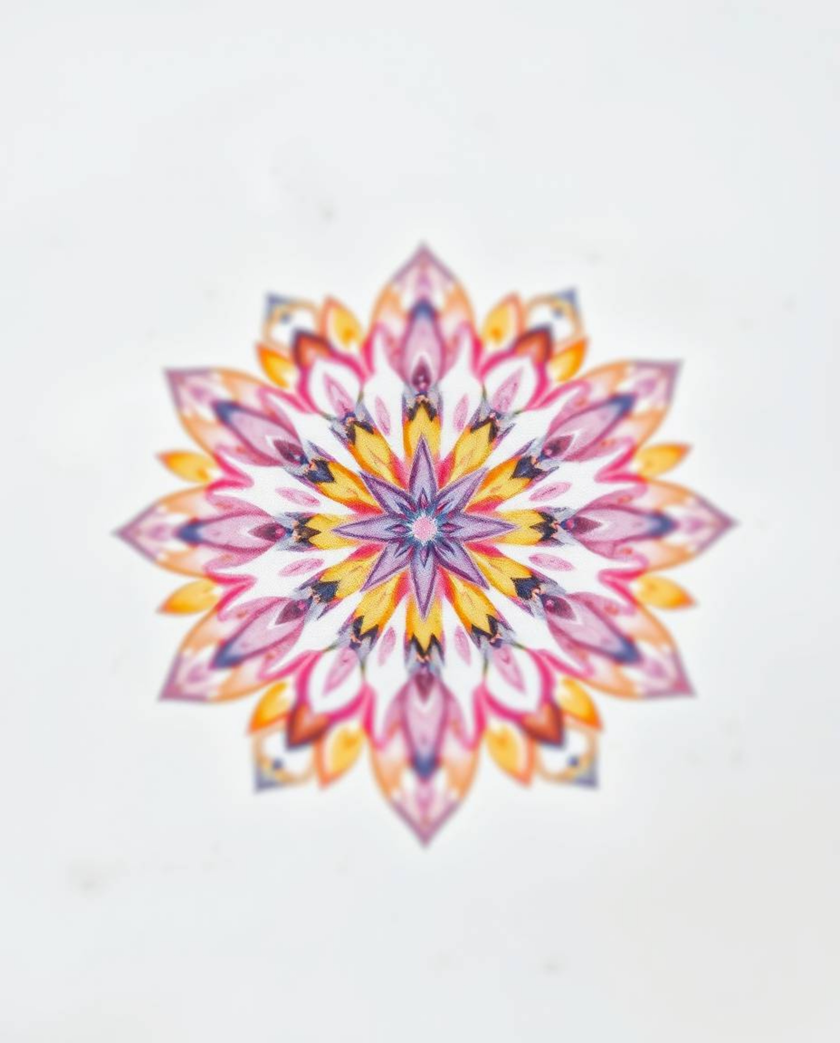A stunning watercolor painting of a geometric floral mandala featuring a vibrant color palette and symmetrical design.  The i
