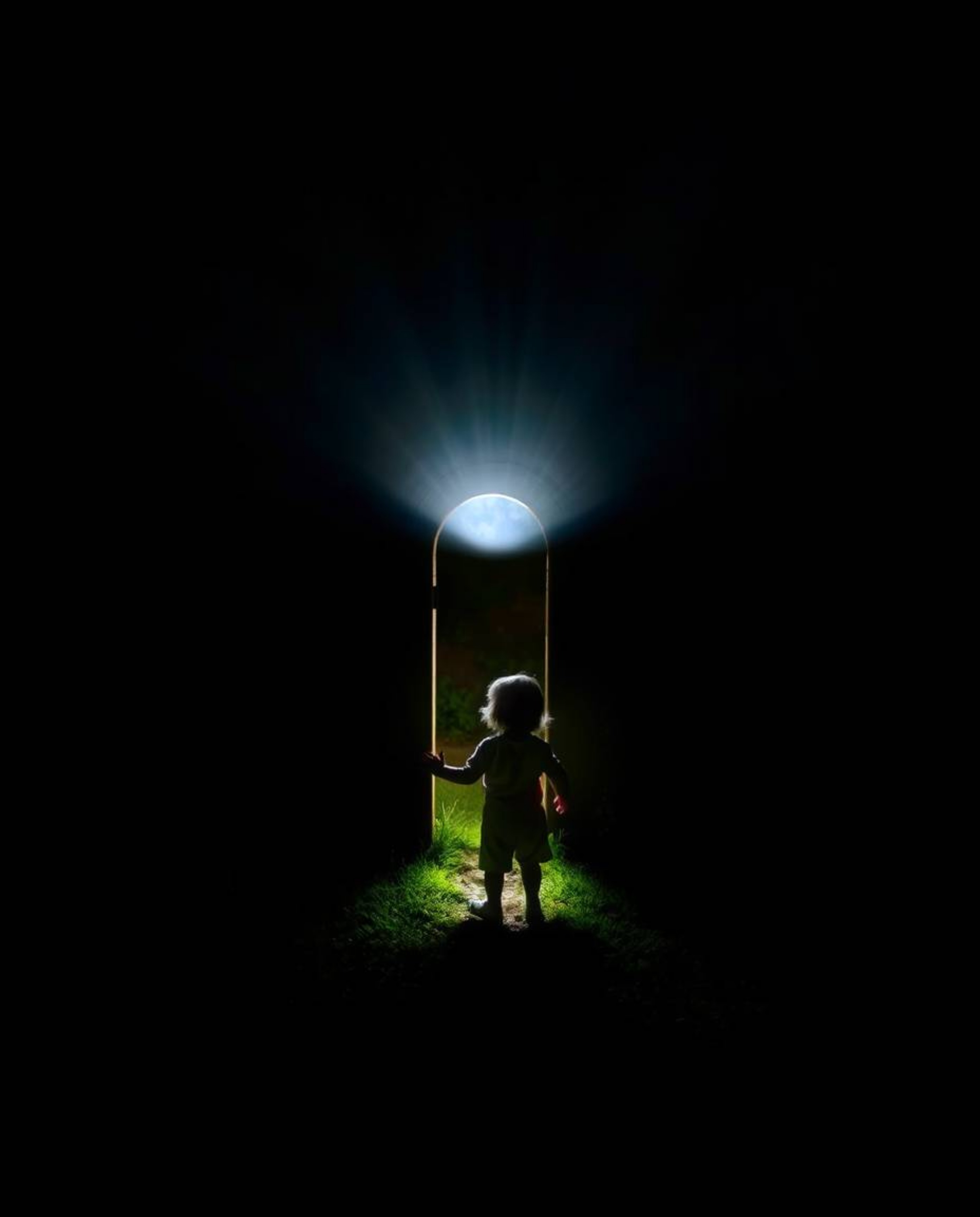 A child's backyard transforms into a realm of wonder as they stumble upon a magical portal, bathed in high contrast, low-key 