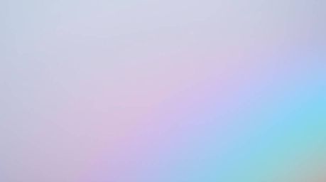 A close-up shot through dense fog reveals an iridescent gradient texture shimmering on a metallic surface. The fog enhances t