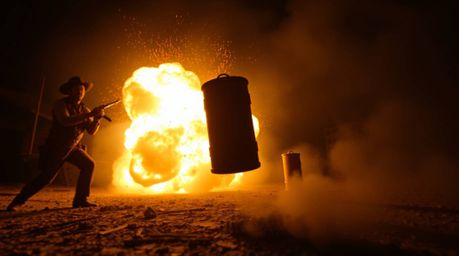 A classic exploding TNT gag set in the wild west, captured from a low angle perspective to maximize the dramatic effect.  Gen