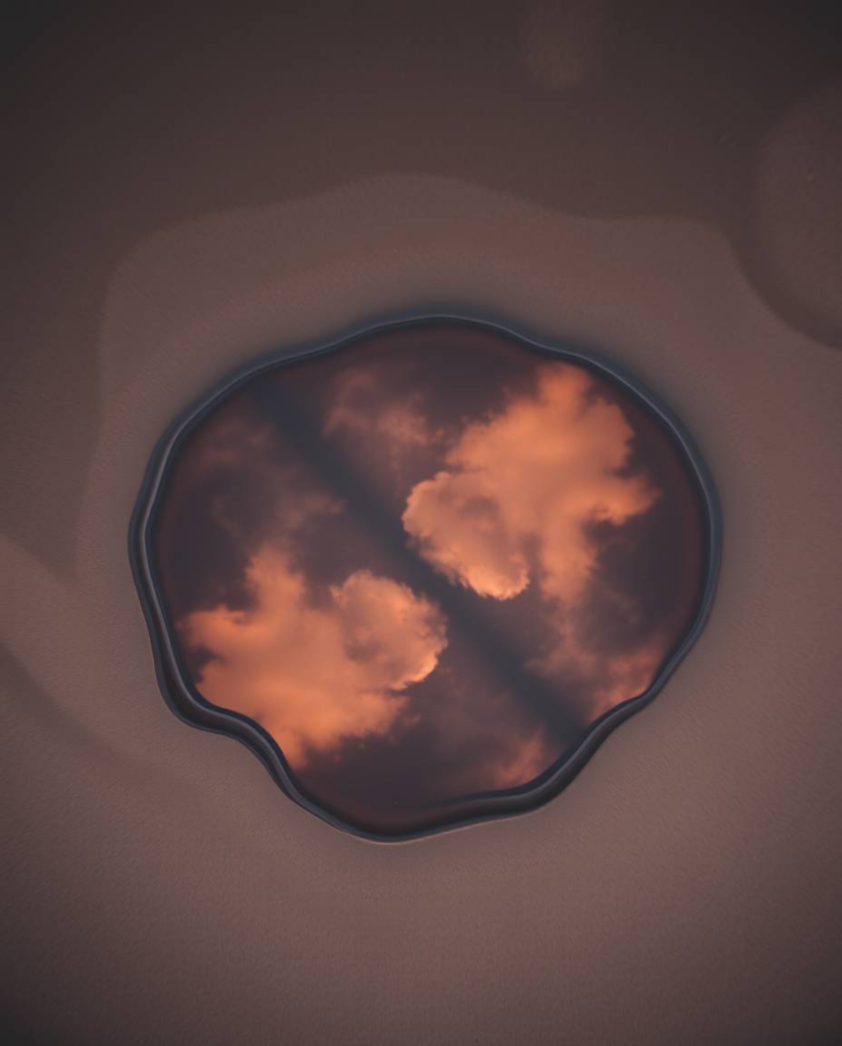 A bird’s-eye view photograph showcases a stunning sunset sky as it is mirrored in the intricate network of tidal pools on a b