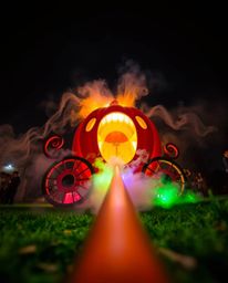 Witness the enchanting transformation of a vibrant pumpkin into a magical carriage! This dynamic, low-angle shot captures the