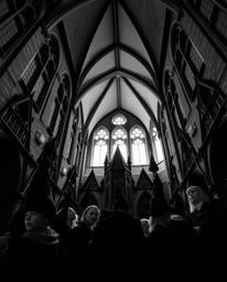 Immerse yourself in the dramatic and timeless elegance of a classic black and white photograph showcasing a magical school fi