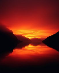 A professional fine art photograph depicting a glassy fjord reflecting a sunset, creating an eerie and creepy atmosphere. The