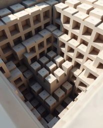 A captivating high-angle shot reveals a mesmerizing repetitive cube pattern, reminiscent of Escher's impossible geometries.  