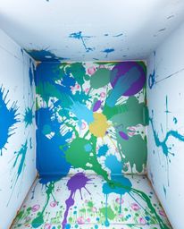 This artwork captures a bird's-eye perspective of a room in a dynamic explosion of paint. The cool color palette, dominated b