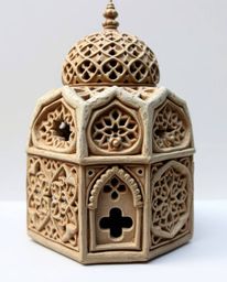 Discover a charming, sculpted papier-mâché piece showcasing intricate Islamic geometric patterns. The layered textures and ad