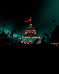 This image depicts a captivating scene of a carnival unexpectedly overrun by wild animals. The use of rich, deep teal tones a