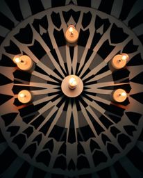 A captivating retro-style black and white geometric optical illusion pattern comes to life, illuminated by the warm and flick