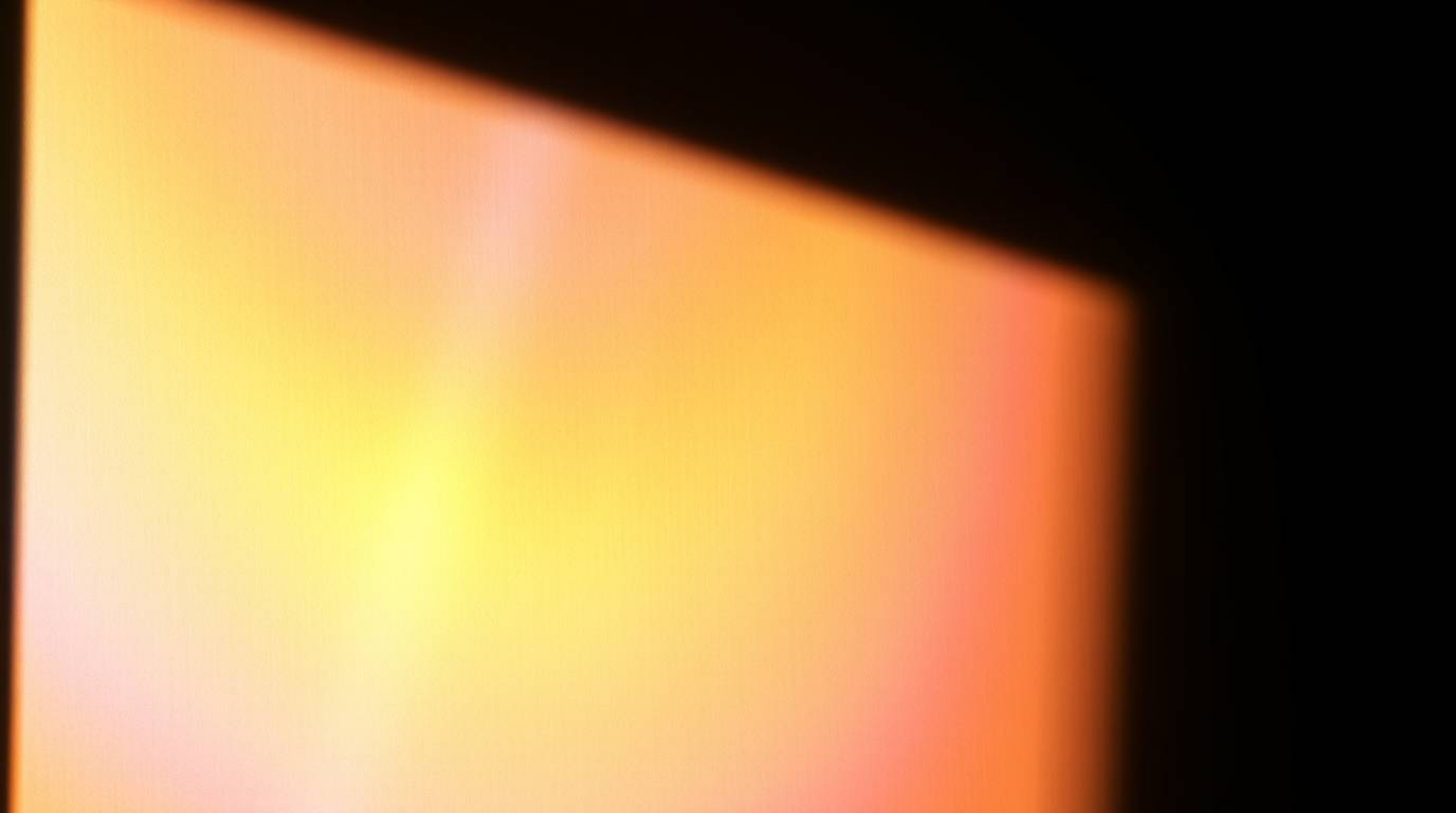 Explore the captivating beauty of an iridescent gradient texture showcased on a metallic surface. This visual spectacle featu