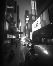 A captivating collection of classic black and white macro photographs depicting a futuristic city in glitch mode.  Experience