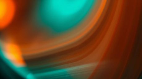 Explore the captivating world of abstract art with this close-up detail of a glass object reflecting smooth gradient textures