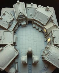 A unique clay artwork presents a bird's-eye view of an empty town square.  The sculpture features intricately modeled shapes,