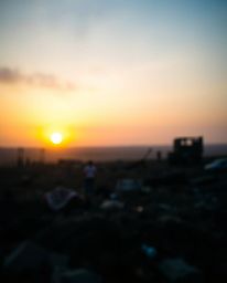 Capture the poignant beauty of a sunrise over a war-torn landscape with this unusual and original fine art photograph. Featur