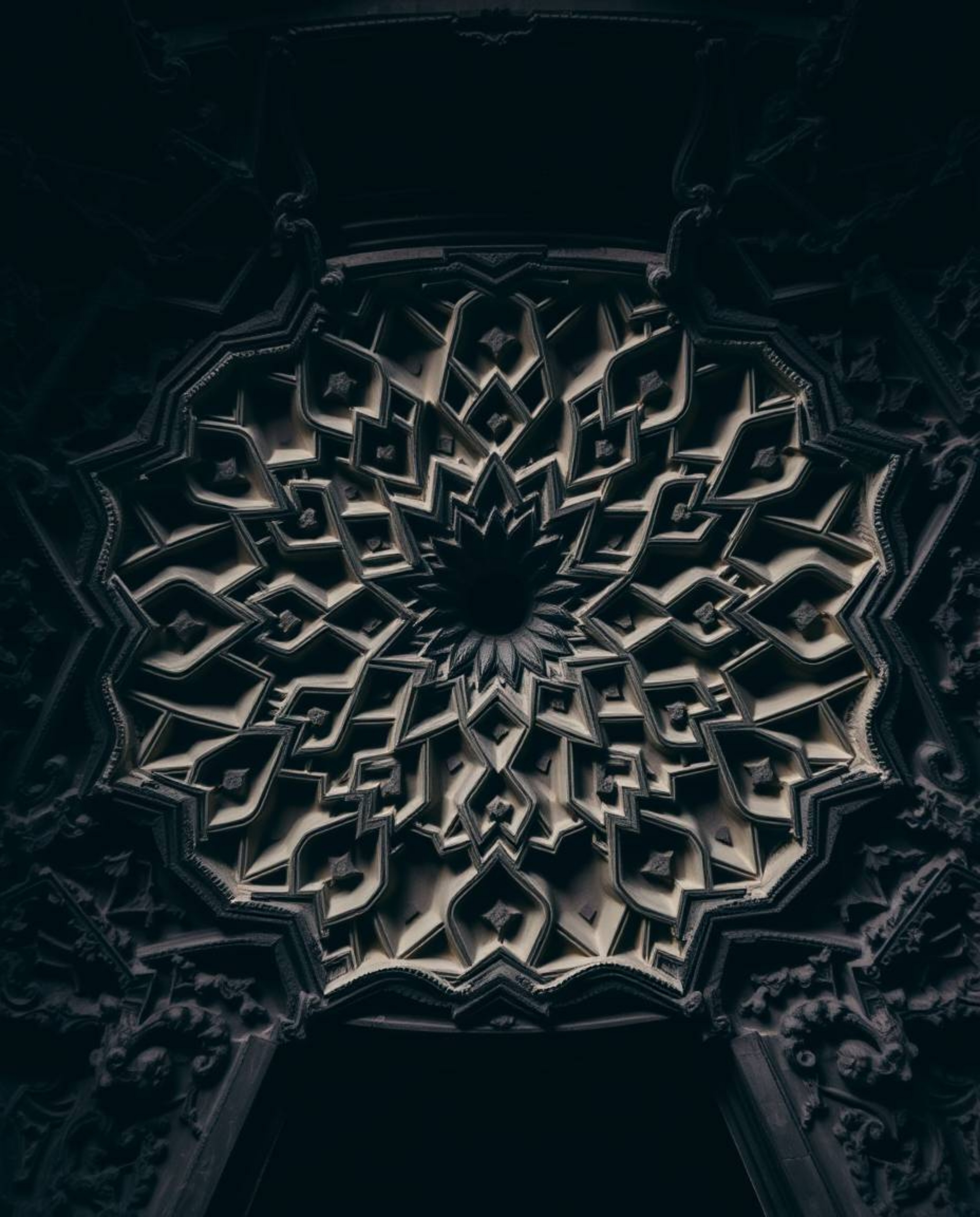 Explore the beauty of Islamic geometric stone carvings, captured in an overhead view with intricate details and historical ac
