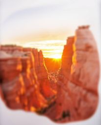 This hand-drawn sketch, rendered in a lively color sketchnote style, captures sandstone cliffs beautifully illuminated by a c