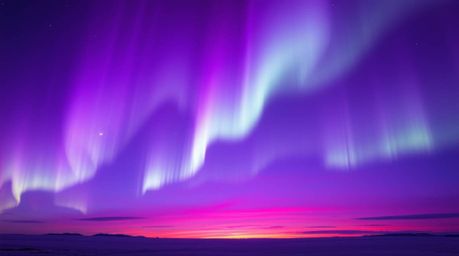 Experience the magic of a high-angle perspective showcasing the Northern Lights in deep ultraviolet hues.  A vibrant sunset s