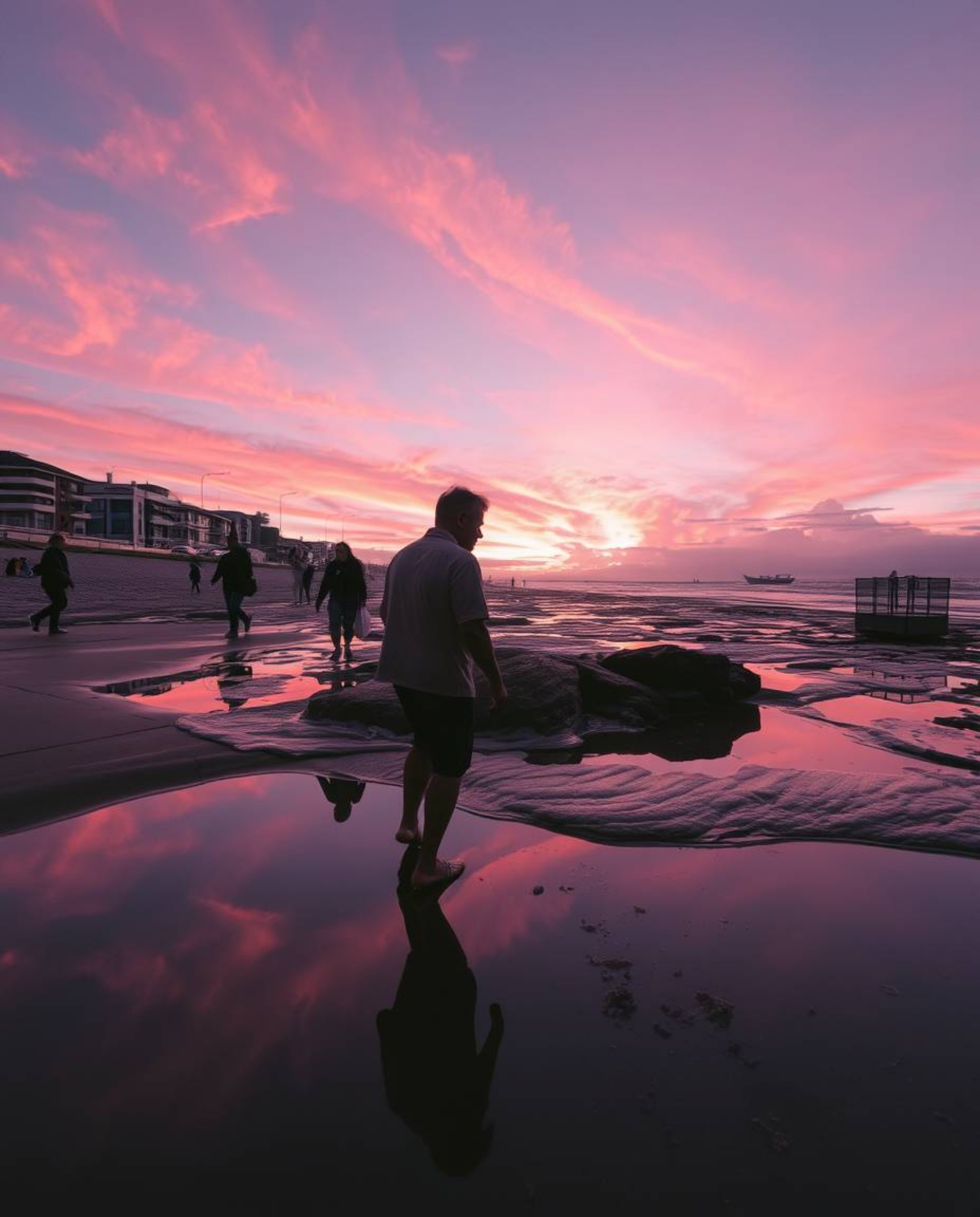 A tight close-up shot, defined by contrasting chiaroscuro lighting, depicts a sunset sky mirrored in the still waters of tida