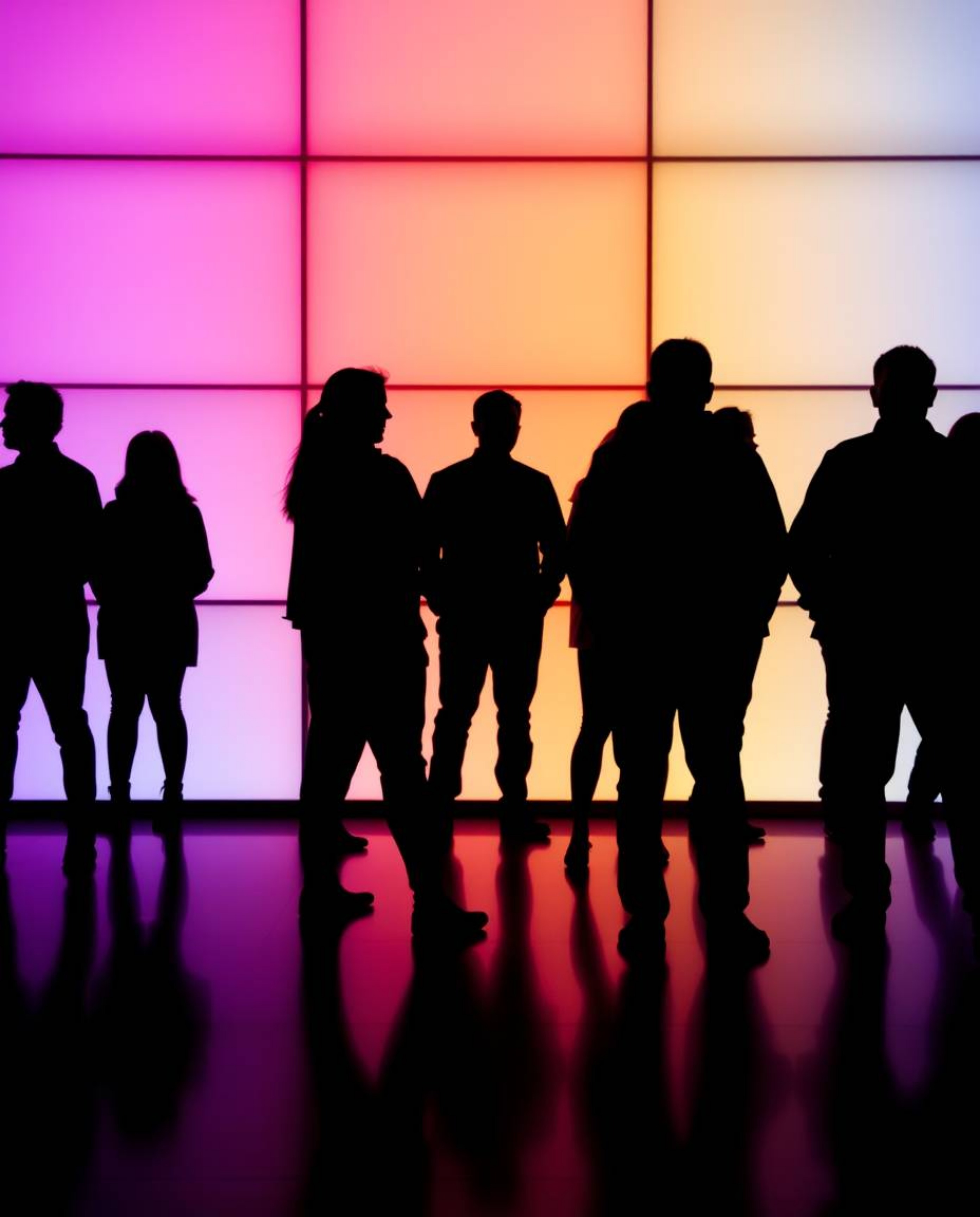 Explore captivating visuals featuring silhouetted figures brought to life with electric vivid colors and geometric pastel gra
