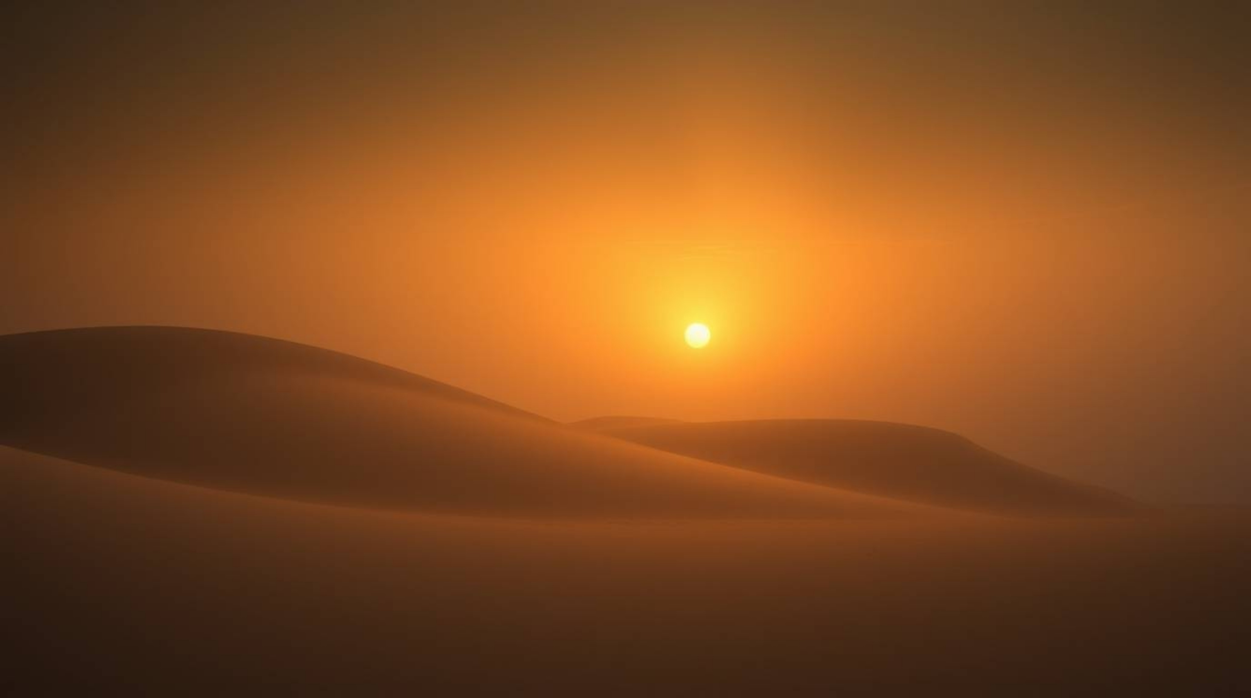 Capture the dreamy, moody atmosphere of a sunset over golden desert dunes.  This image evokes a mystical feel with its low co