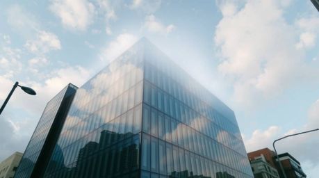 Explore captivating street photography showcasing an ethereal spiritual vibe alongside a modern glass building seamlessly dis